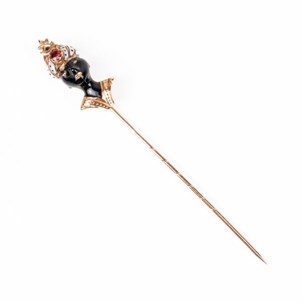 A GOLD, ENAMELLED AND GEM SET STICK PIN