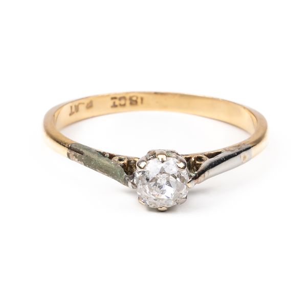 A GOLD AND PLATINUM, DIAMOND SINGLE STONE RING