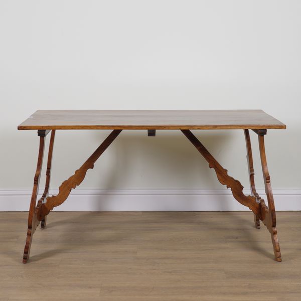 A SPANISH OAK DINING TABLE