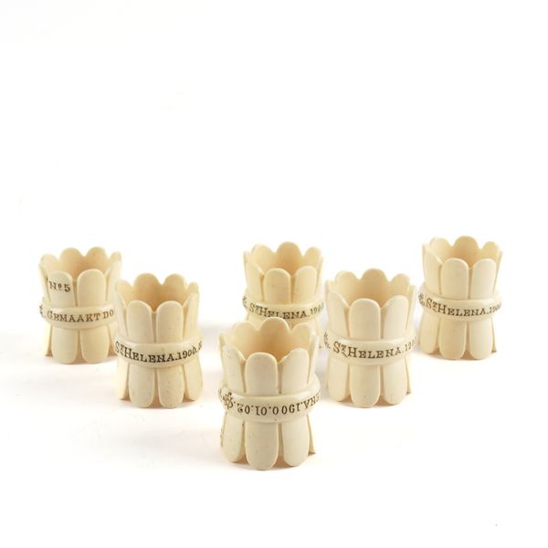 A SET OF SIX BOER WAR ST HELENA CARVED BONE PRISONER OF WAR NAPKIN RINGS (6)