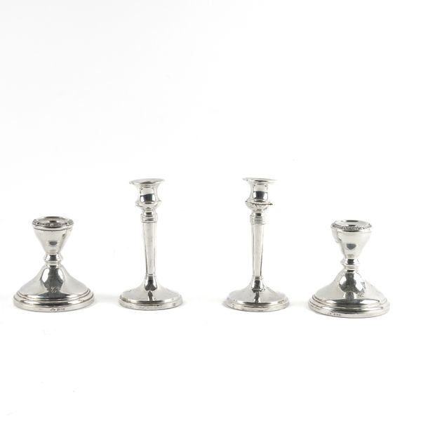 TWO PAIRS OF SILVER CANDLESTICKS