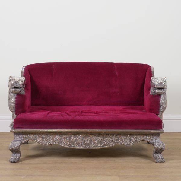 A 20TH CENTURY EASTERN WHITE METAL VENEERED SOFA