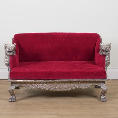 A 20TH CENTURY EASTERN WHITE METAL VENEERED SOFA
