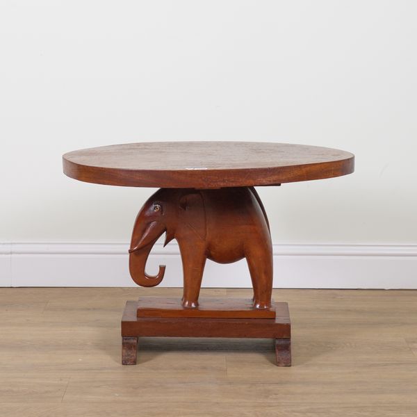 A 20TH CENTURY INDIAN TEAK OVAL TABLE