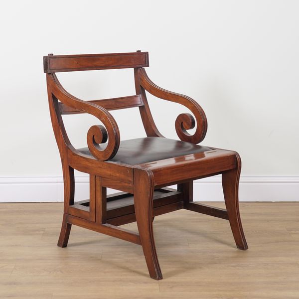 A REGENCY STYLE LARGE MAHOGANY METAMORPHIC LIBRARY OPEN ARMCHAIR