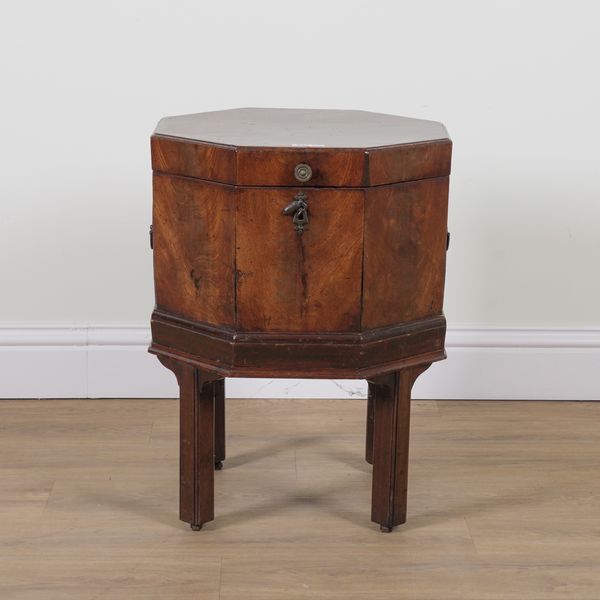 A GEORGE III MAHOGANY OCTAGONAL CELLARETTE ON STAND