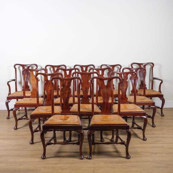 A SET OF FOURTEEN GEORGE II STYLE WALNUT VASE BACK DINING CHAIRS (14)