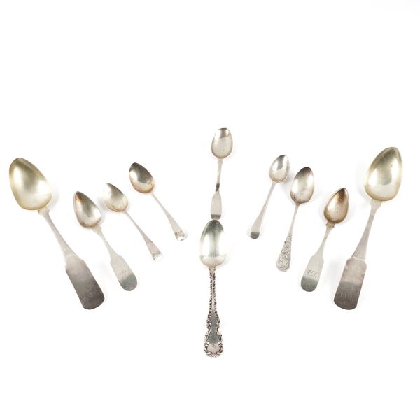 A GROUP OF MOSTLY BRITISH AND FOREIGN SILVER SPOONS AND ONE PLATED SPOONS (10)