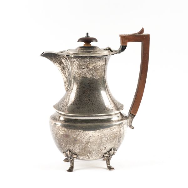 A SILVER HOT WATER JUG