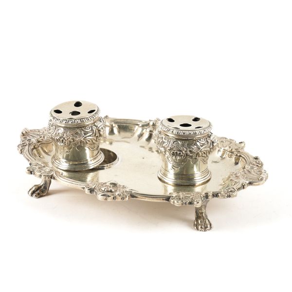 A SILVER SHAPED OVAL INKSTAND WITH A PAIR OF INKWELLS (3)