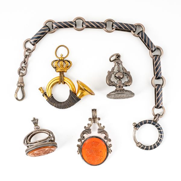 EUROPEAN ITEMS; THREE FOB SEALS, A NIELLO DRESS ALBERT CHAIN AND A GILT METAL BUGLE PENDANT (5)