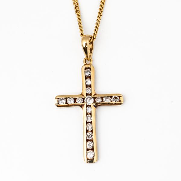 A 9CT GOLD AND DIAMOND PENDANT CROSS (2)