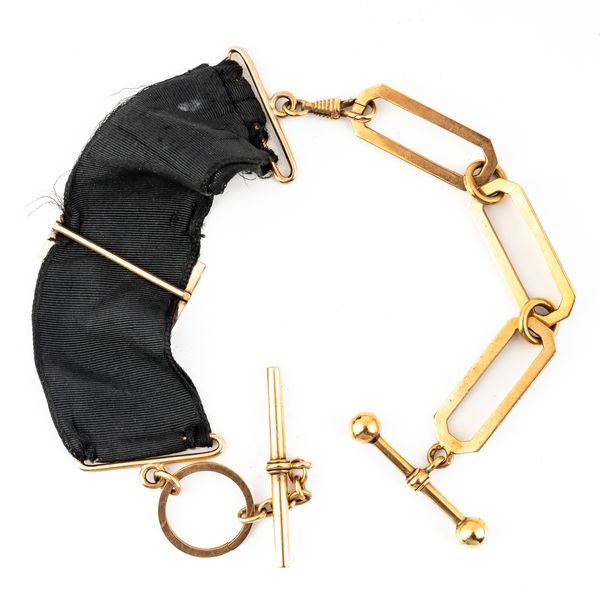 A GOLD DRESS ALBERT CHAIN AND A GOLD MOUNTED BLACK RIBBON WATCH FOB (2)