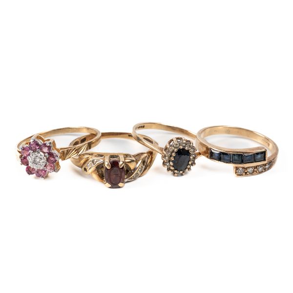 FOUR 9CT GOLD AND GEM SET RINGS (4)