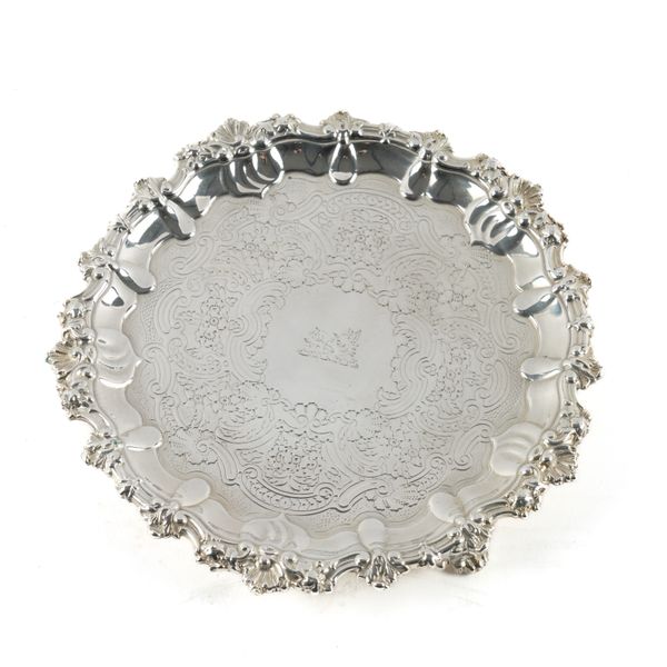 A GEORGE IV SILVER SHAPED CIRCULAR SALVER