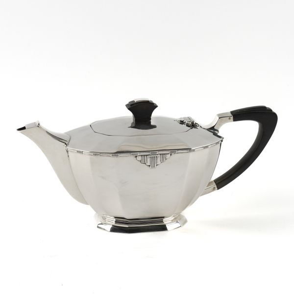 A SILVER TEAPOT