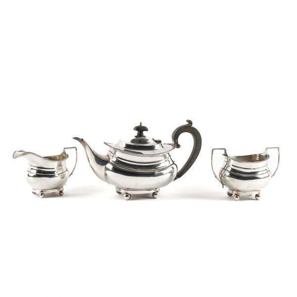 A SILVER THREE PIECE TEA SET (3)