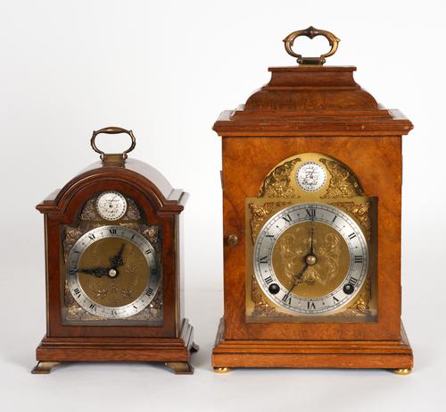TWO ELLIOT ‘TEMPUS FUGIT’ CLOCKS: A QUEEN ANNE STYLE WALNUT CASED MANTEL CLOCK AND ANOTHER TIMEPIECE (2)