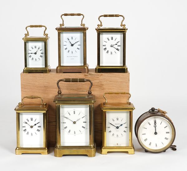 SEVEN BRASS TIMEPIECE CARRIAGE CLOCKS (7)