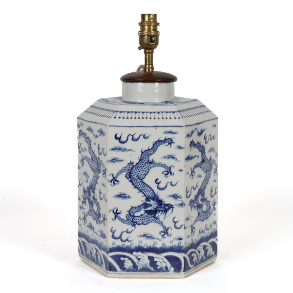 A CHINESE BLUE AND WHITE HEXAGONAL URN OR STORAGE JAR ADAPTED AS A TABLE LAMP