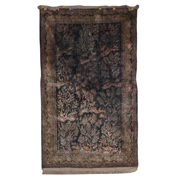 A SILK GHOM RUG