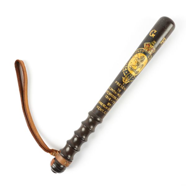 A LIGNUM-VITAE GILT-DECORATED PRESENTATION TRUNCHEON