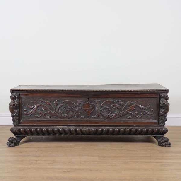 A 17TH CENTURY ITALIAN CARVED WALNUT CASSONE