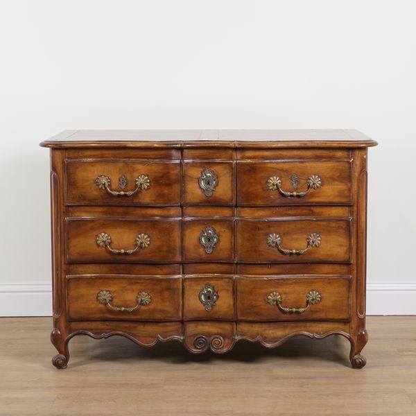 DE TONGE; AN 18TH CENTURY STYLE FRENCH WALNUT THREE DRAWER SERPENTINE COMMODE