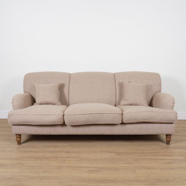 SOFAS & STUFF; A MODERN BEIGE UPHOLSTERED THREE SEAT SOFA