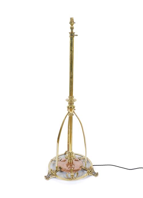 AN ART NOUVEAU STYLE BRASS AND COPPER ADJUSTABLE FLOOR STANDING LAMP