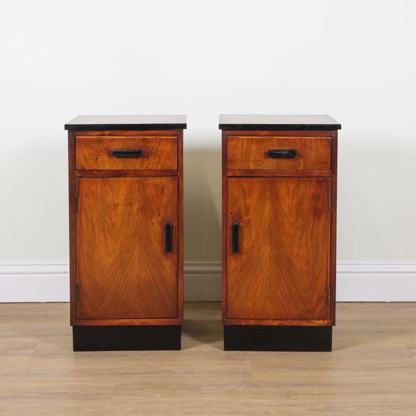 A PAIR OF ART DECO STYLE WALNUT BEDSIDE CUPBOARDS (2)