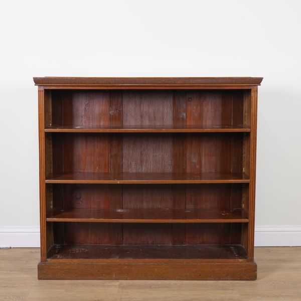 A MODERN OAK OPEN BOOKCASE