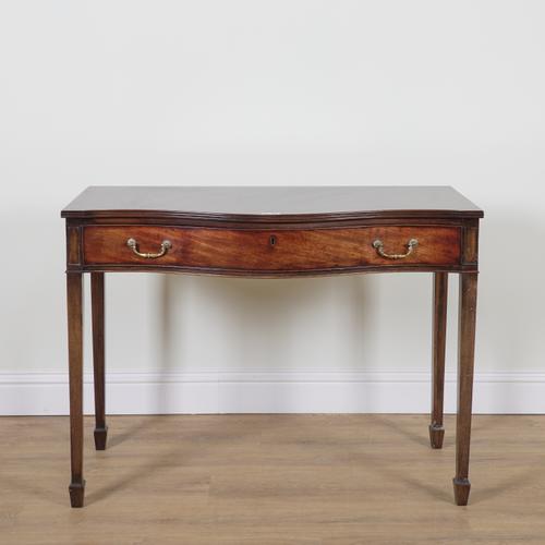 A GEORGE III SERPENTINE MAHOGANY SINGLE DRAWER SIDE TABLE