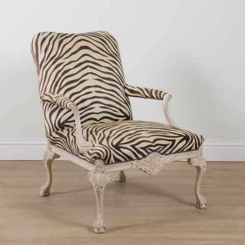 AN 18TH CENTURY STYLE WHITE PAINTED OPEN ARMCHAIR