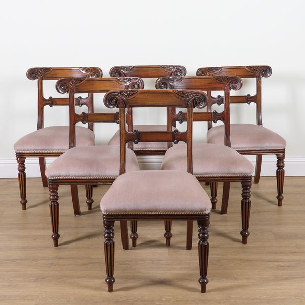 A SET OF SIX REGENCY STYLE MAHOGANY BAR BACK DINING CHAIRS (6)