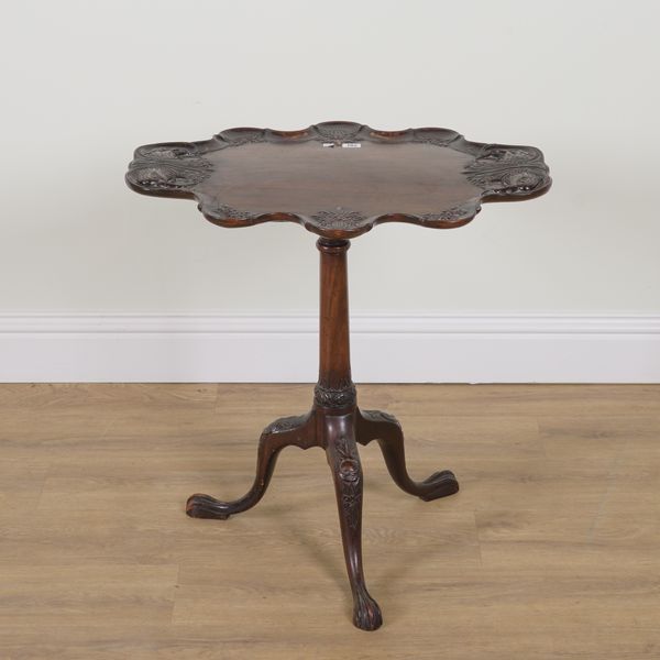 A LATE 19TH CENTURY CARVED MAHOGANY TRIPOD TABLE