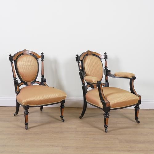 A PAIR OF VICTORIAN LADY'S AND GENT'S GILT METAL MOUNTED EBONISED AND WALNUT CHAIRS (2)