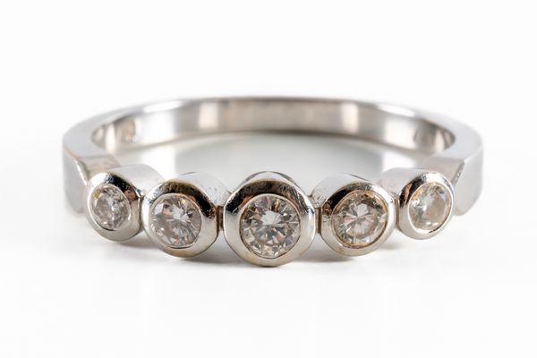 A WHITE GOLD AND DIAMOND FIVE STONE RING