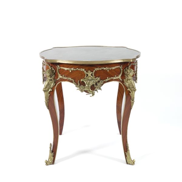 A GILT METAL MOUNTED WALNUT MARBLE INSET SHAPED CENTRE TABLE