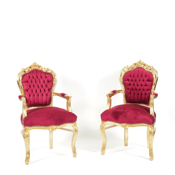 A PAIR OF GILT FRAMED OPEN ARMCHAIRS (2)