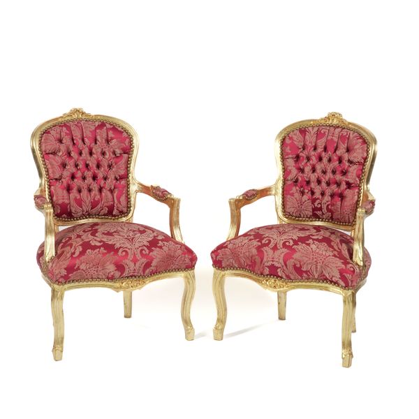 A PAIR OF GILT FRAMED OPEN ARMCHAIRS (2)