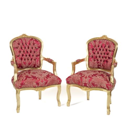 A PAIR OF GILT FRAMED OPEN ARMCHAIRS (2)