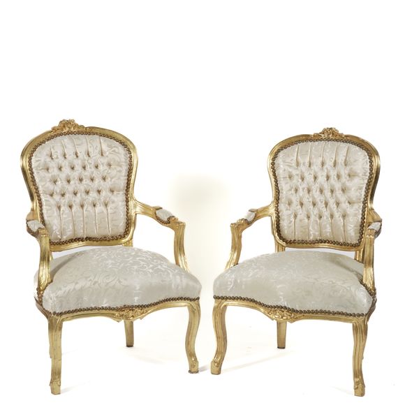 A PAIR OF GILT FRAMED OPEN ARMCHAIRS (2)