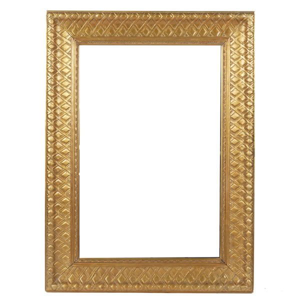 A GILT FRAMED RECTANGULAR WALL MIRROR