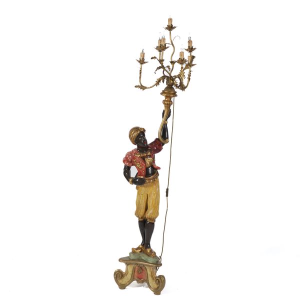 A POLYCHROME PAINTED FIGURAL CANDELABRA