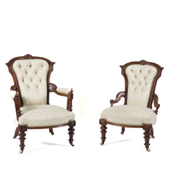 A PAIR OF VICTORIAN WALNUT FRAMED LADY'S AND GENT'S EASY ARMCHAIRS (2)