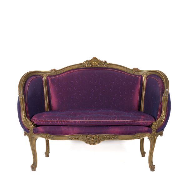 A GILT FRAMED TUB BACK TWO SEAT SOFA