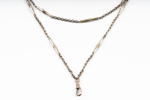 A VICTORIAN GOLD LONG GUARD CHAIN