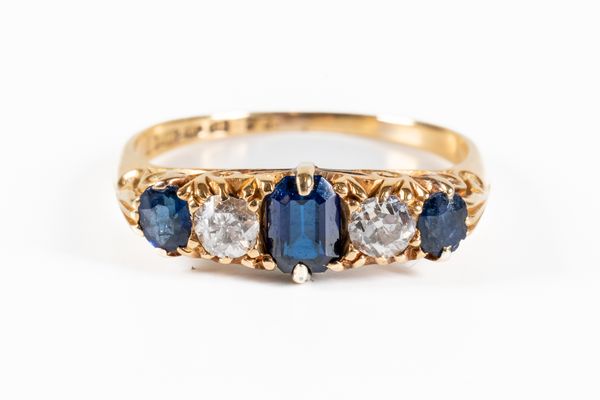 A SAPPHIRE AND DIAMOND FIVE STONE RING