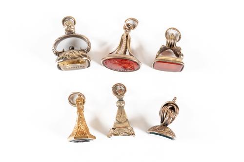 SIX PENDANT FOB SEALS (6)